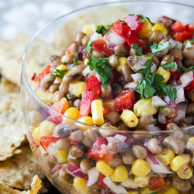 Bowl of Field Peas Salsa served with chips