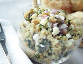 a close up of a cup of chickpea hot pot