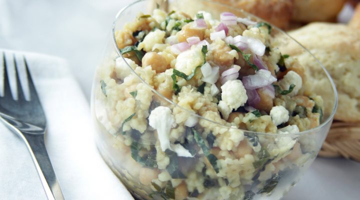 a close up of a cup of chickpea hot pot