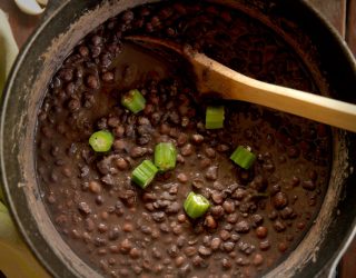 a pot full of crowder peas and okra