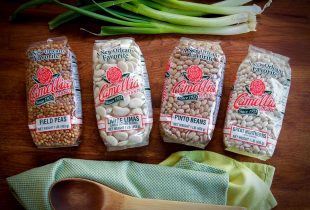 4 bags of camellia brand beans on a cutboard