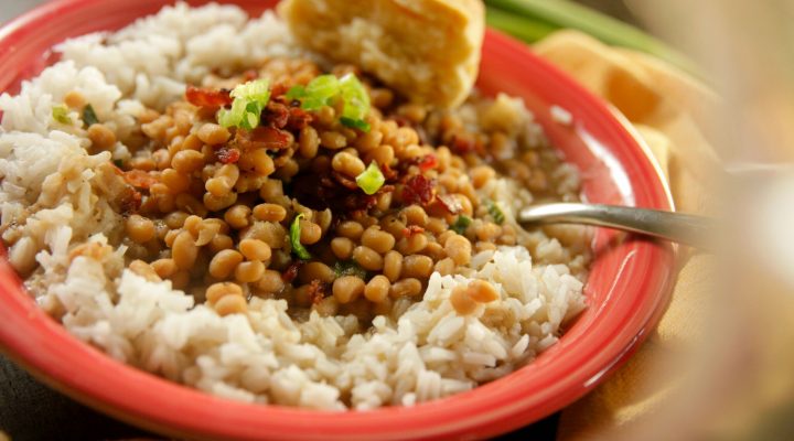 a close up of a plate full of lady cream peas and rice