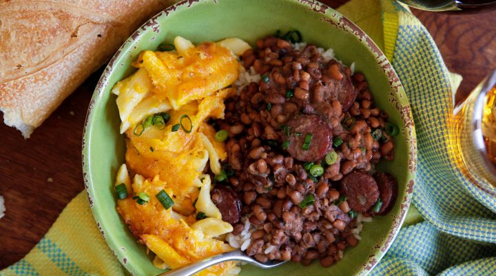 a bowl of Patricia’s Perfect Field Peas with sasuage and a type of penne pasta and cheese