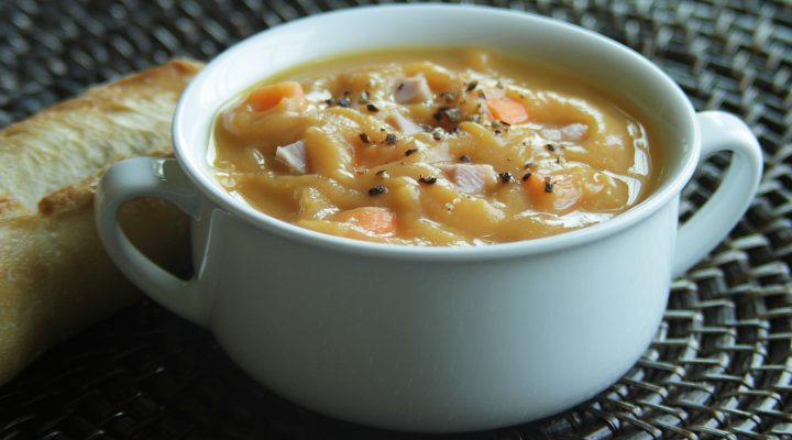 a close up of a bowl of sawyers yellow split pea soup