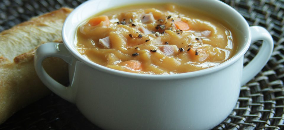 a close up of a bowl of sawyers yellow split pea soup