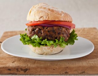 a plate with a black bean burger