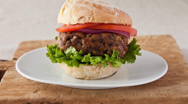 a plate with a black bean burger