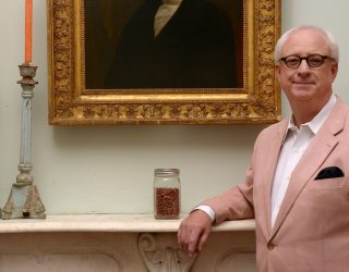 a profile of marsden next to a jar of red beans