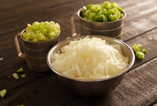 a close up of 3 mixing bowls full of the trinity