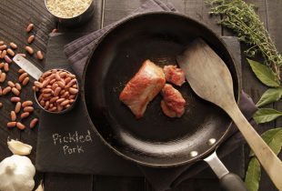 Pickled Pork cooking on a cast iron pan