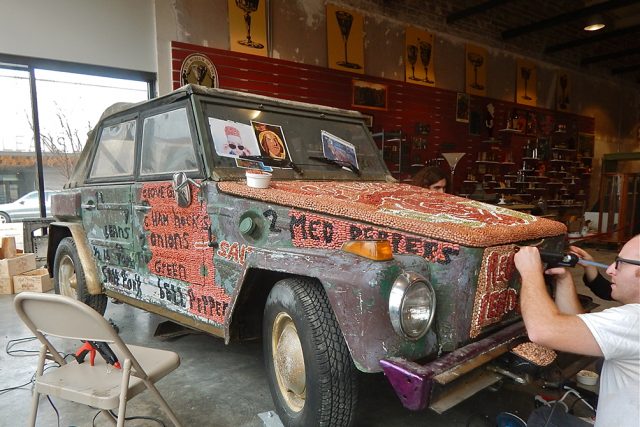 The redesigned Beanmobile is being decorated by the Krewe of Red Beans at the Southern Food and Beverage Museum