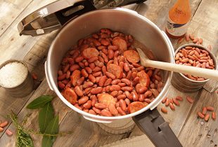 cooked red beans and sausage in a pressure cooker