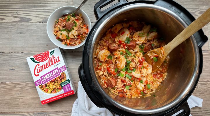 InstaPot of Jambalaya with Camellia Brand's Jambalaya Seasoning Mix next to it