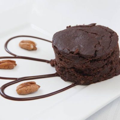 a close up of a Cherry Pecan Black Bean Brownies