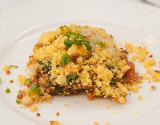 a close up of a plate of Baked Red Bean Past with Cornbread Crumble