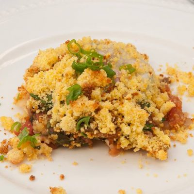 a close up of a plate of Baked Red Bean Past with Cornbread Crumble