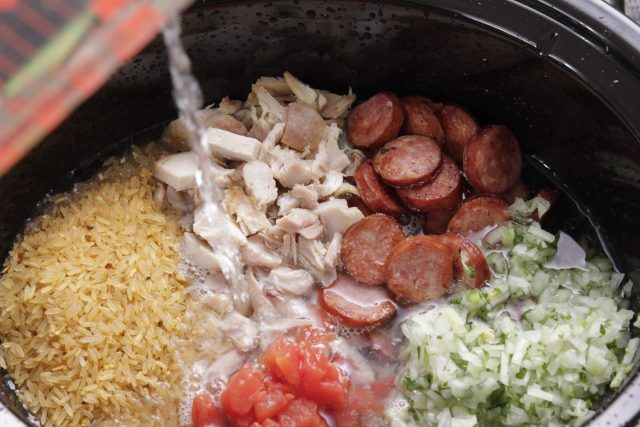 Adding water to Camellia Jambalaya Dinner Mix