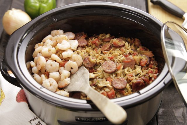 Adding shrimp to Camellia Jambalaya Dinner Mix in a slow cooker