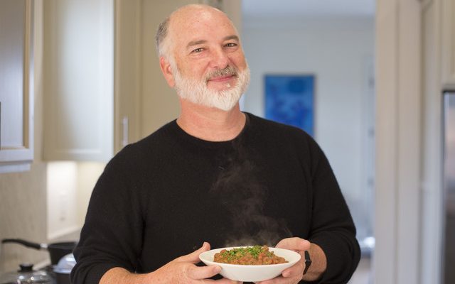 photo of Pableaux Johnson holding a dish, courtesy of PeachDish.com