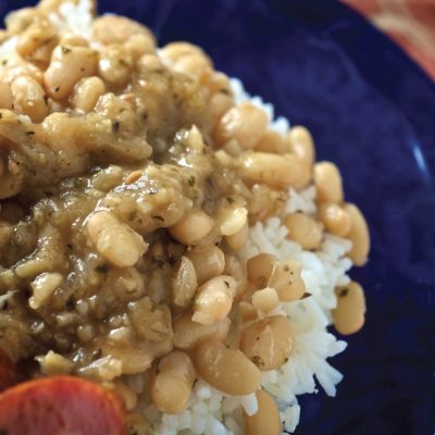 a close up of a plate of Where Yat White Beans