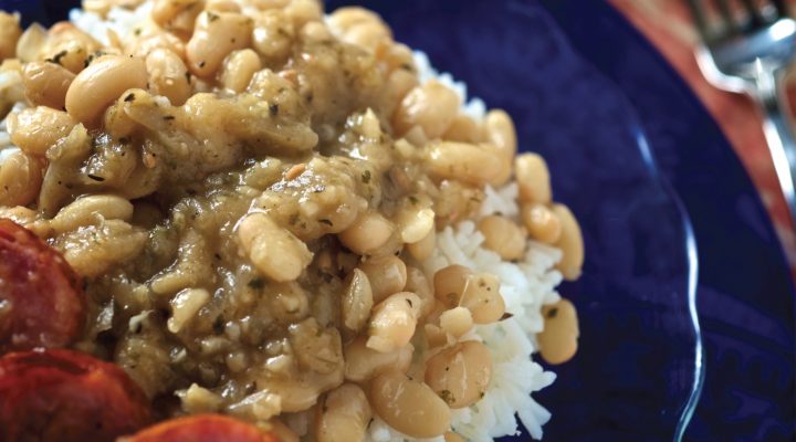 a close up of a plate of Where Yat White Beans