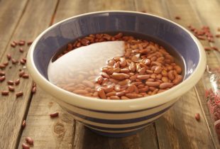 a bowl full of soaking red beans