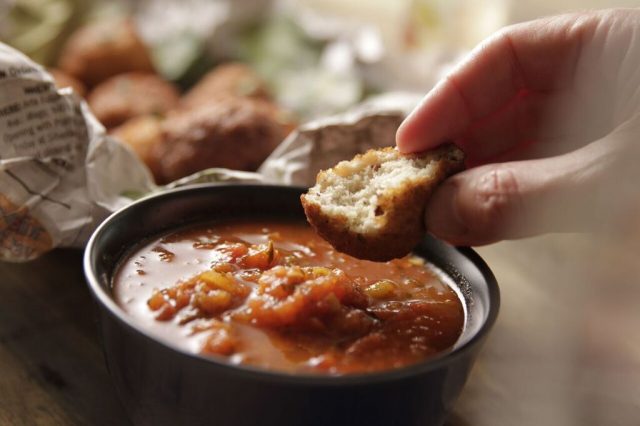 Serve delicious blackeye pea fritters with hot sauce or salsa