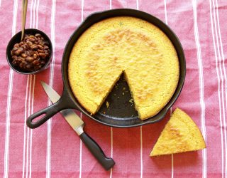 a cast iron skillet full of corn bread