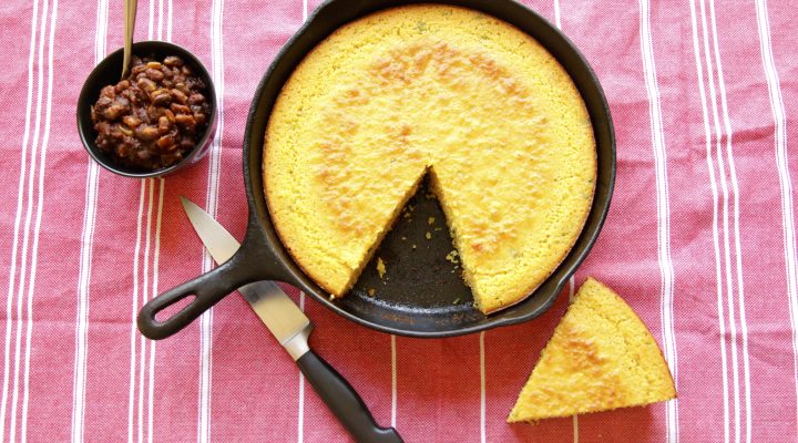 a cast iron skillet full of corn bread