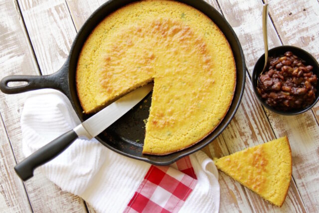 Buttermilk Cornbread in Cast Iron Skillet with a side of red beans