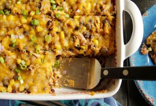 a dish of Smoked Chicken and Black Bean Enchilada Casserole