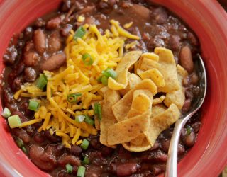 a close up of a bowl of 3 bean vegetarian chili