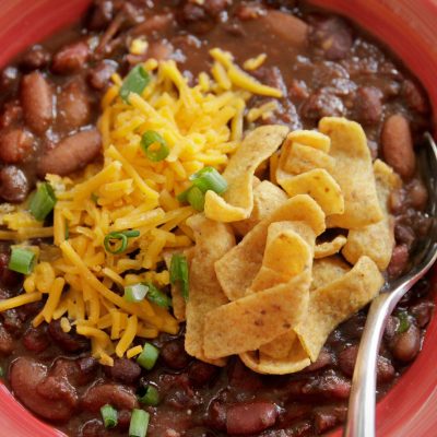 a close up of a bowl of 3 bean vegetarian chili