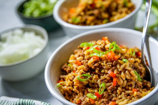 Close up of dirty rice inside of a bowl