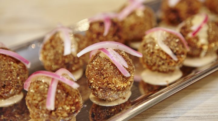 a close up of jay ducote's red beans and rice balls