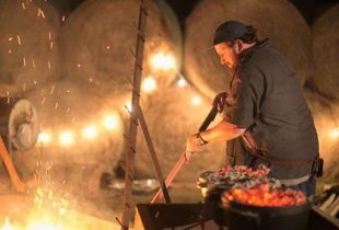 chef jay ducote cooking red beans for his red beans and rice tour at night