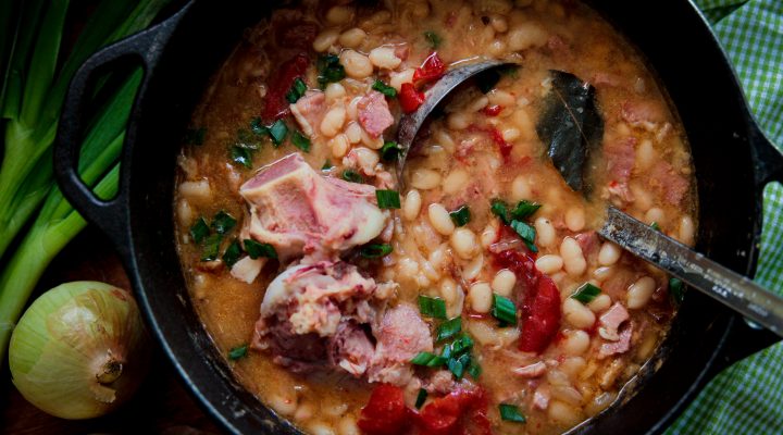 Cameilla beans, cilantro and chicken in a cast iron pan