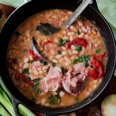 Cooked great northern beans with ham dish