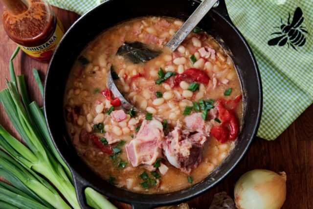 Cooked great northern beans with ham dish