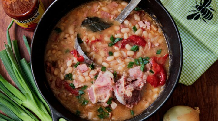 Cooked great northern beans with ham dish