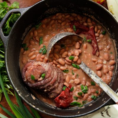 Pinto beans and ham hocks in dutch oven