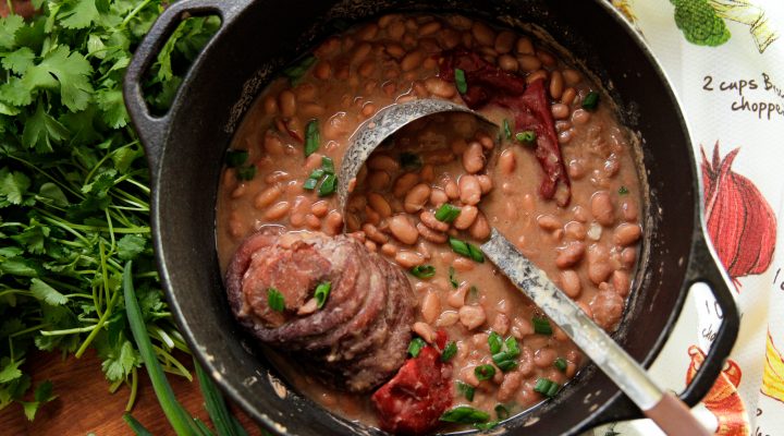 Pinto beans and ham hocks in dutch oven