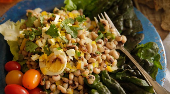 a close up of marinated black eye peas