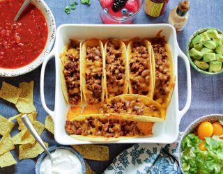 7 oven baked beef and pinto bean tacos in an oven pan