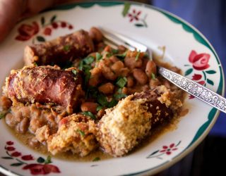 a close up of a plate of cassoulet