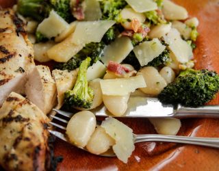 a close up of white bean roasted broccoli