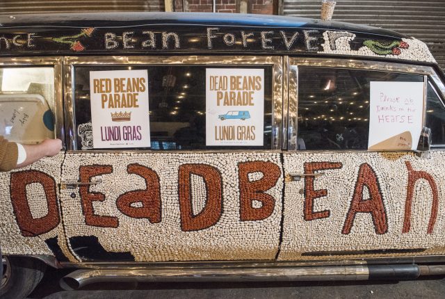 Red Beans Krewe working on beaning a hearse for the Dead Beans parade on January 31, 2019.