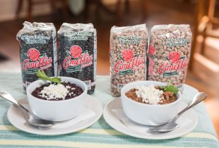 2 bowls of canal bistro frioles de olla next to packages of black beans and pinto beans