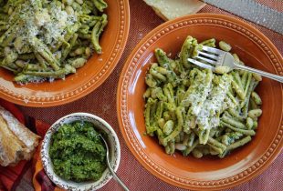 a bowl of white bean pesto pasta