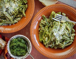 a bowl of white bean pesto pasta